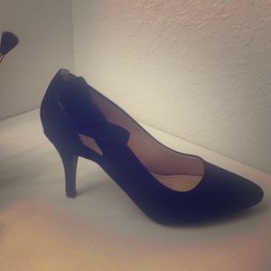 Black heeled shoe.